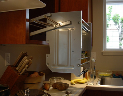 pull down accessible shelf rack in kitchen cabineat